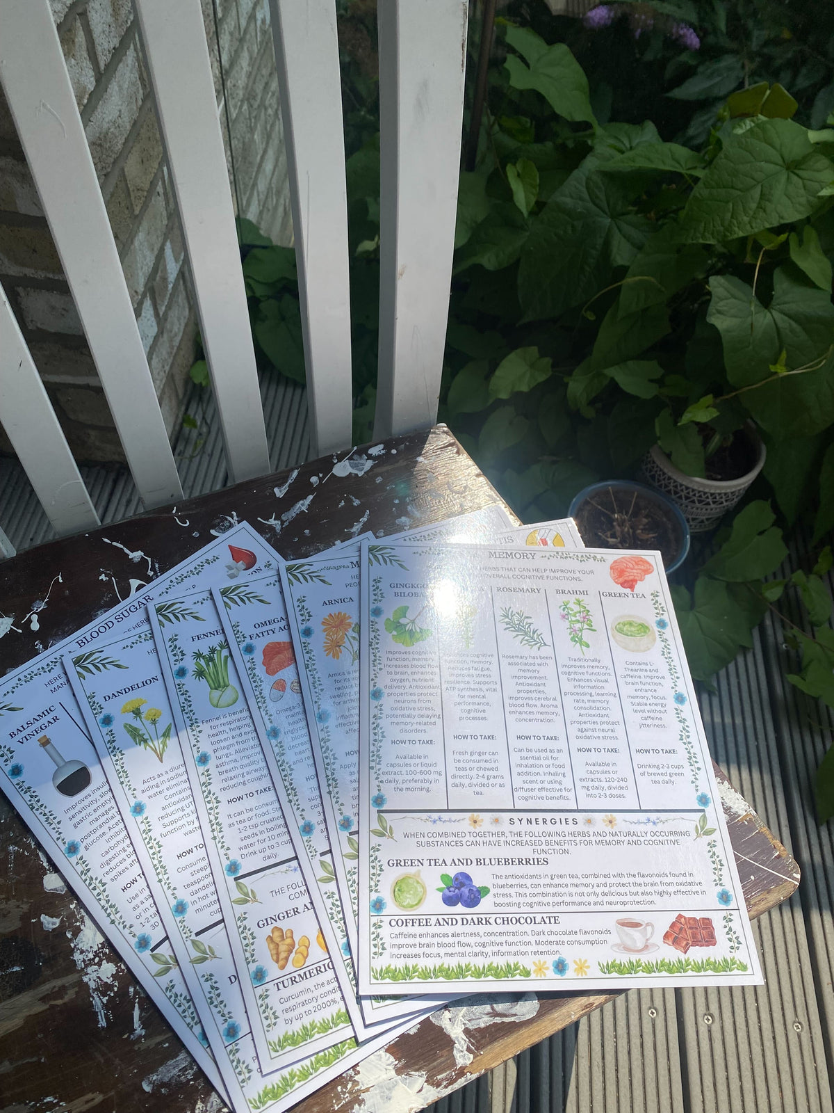 Informational sheets and various spice jars on a kitchen counter, promoting health benefits of herbs and spices.